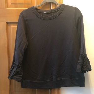 Black sweater with puff sleeves
